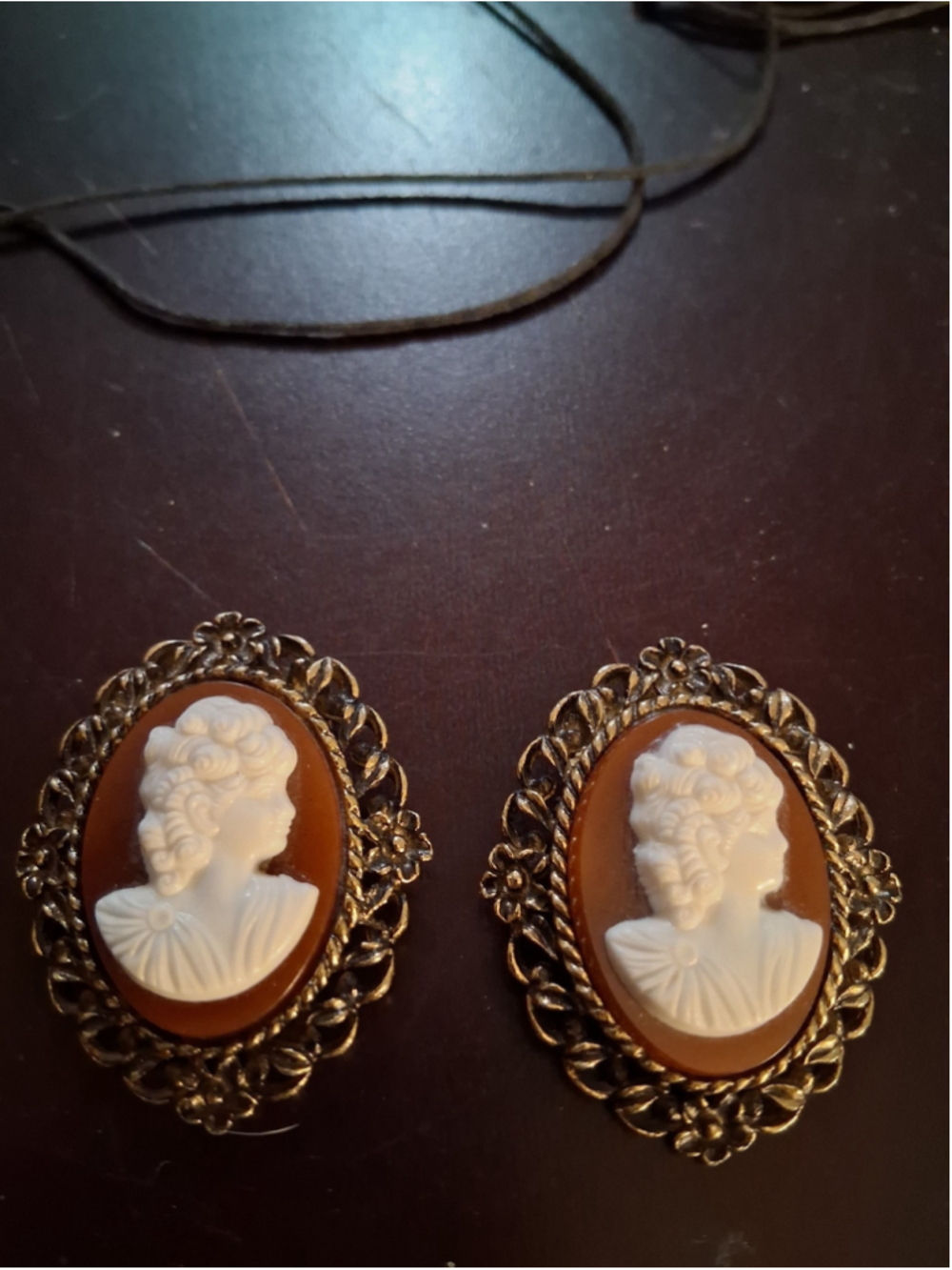 A pair of vintage 1960s cameo shoe clips